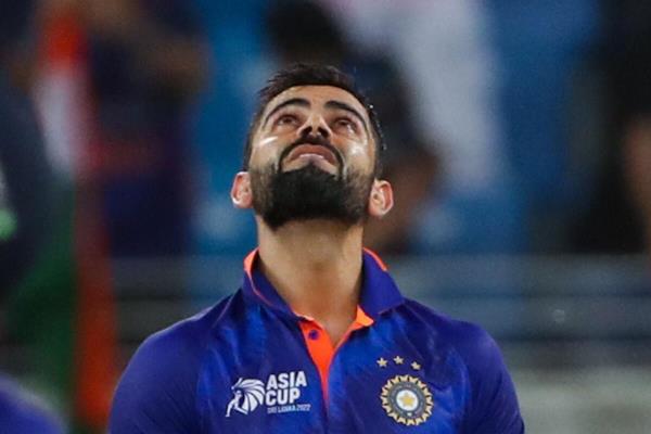Indian batsman Virat Kohli reacts after scoring a half-century against Pakistan. (AFP)