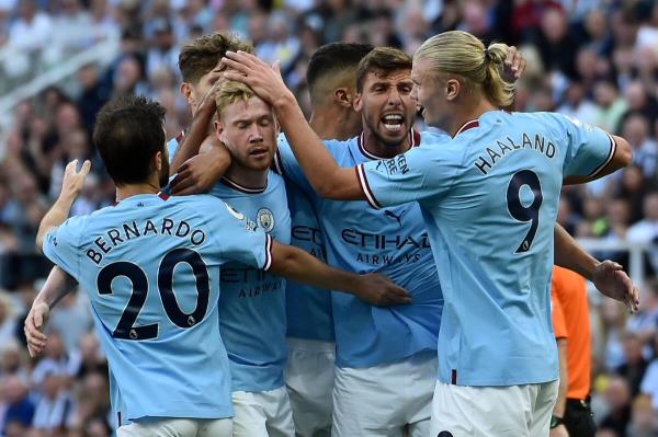 Manchester City's Bernardo Silva (left) celebrates with teammates after scoring his side's third goal. (AP)