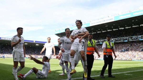 Leeds United's Brenden Aaro<em></em>nson celebrates after scoring their first goal with teammates. (Reuters)